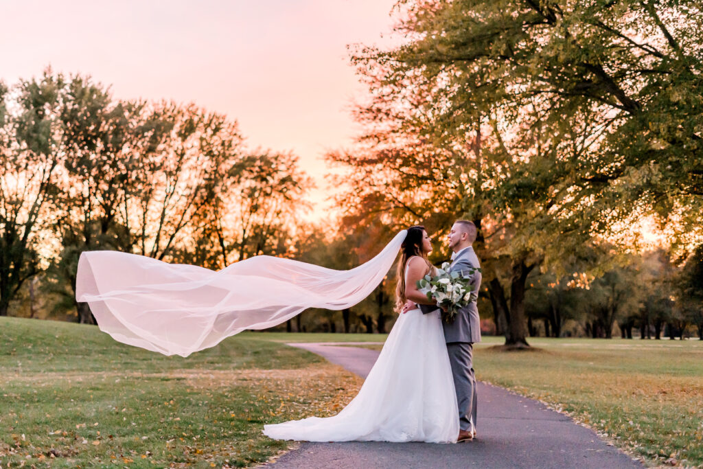 Groom and bride portraits at sunset