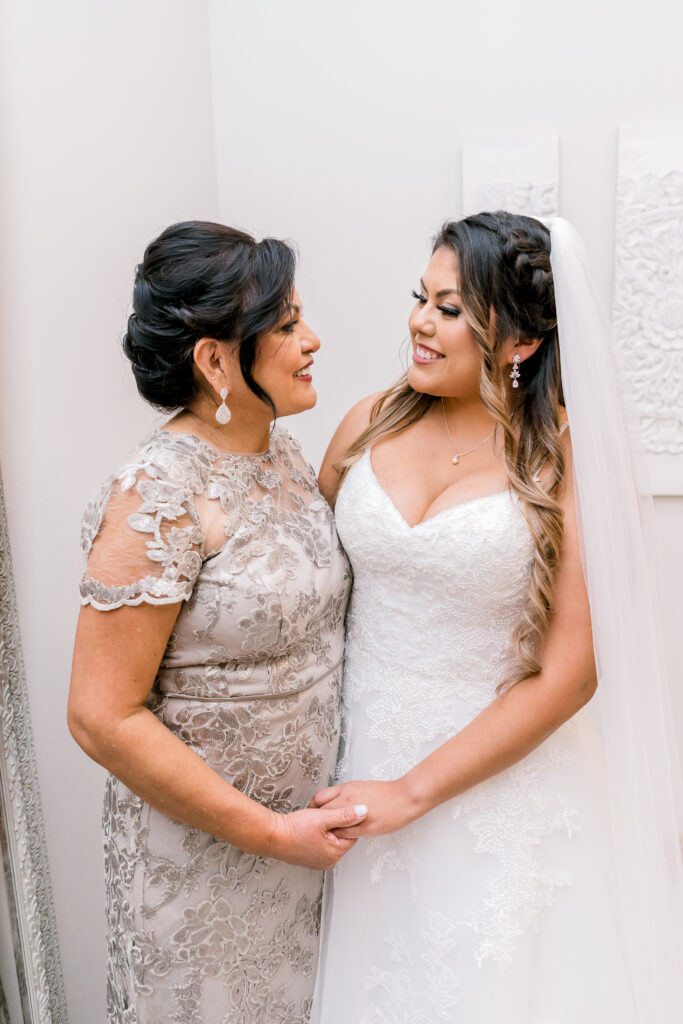 Bride and stepmother smiling before the wedding