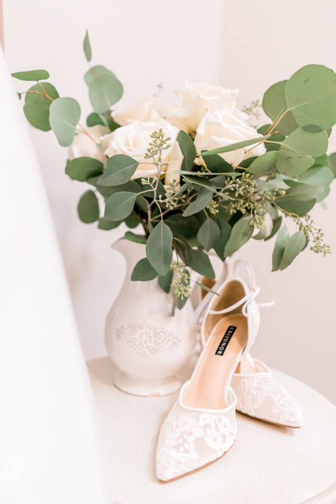 Wedding bouquet, bride's shoes.